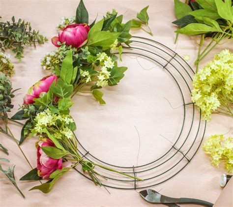 how to make fabric leaves wreath on metal frame|how to attach flowers to metal wreath.